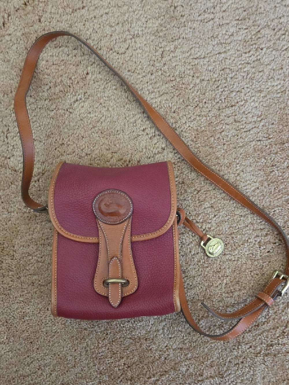 Dooney & Bourke Burgundy Pebbled Leather Crossbody with Tan Trim